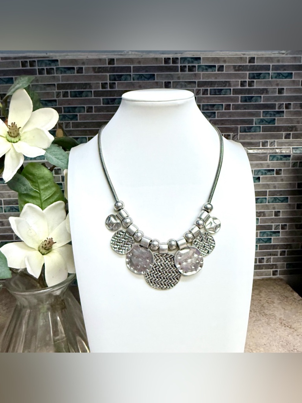 Erica Lyons silver hammered disc necklace